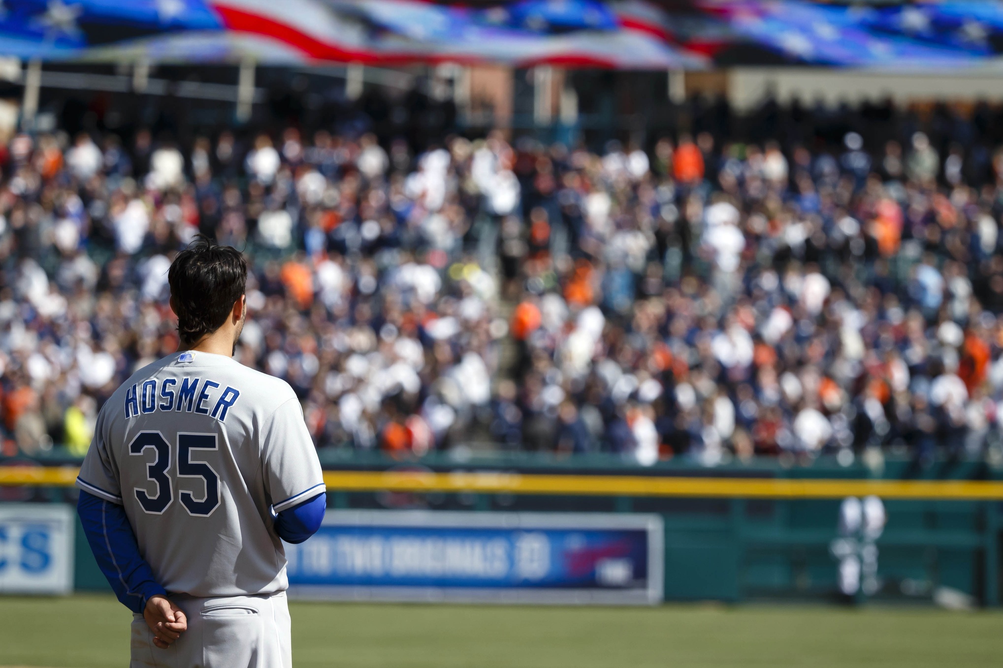Mar 31, 2014; Detroit, MI, USA; Kansas City Royals first baseman Eric Hosmer (35) during the singing of God Bless America in seventh inning stretch of an opening day baseball game against the Detroit Tigers at Comerica Park. Detroit won 4-3. Mandatory Credit: Rick Osentoski-USA TODAY Sports