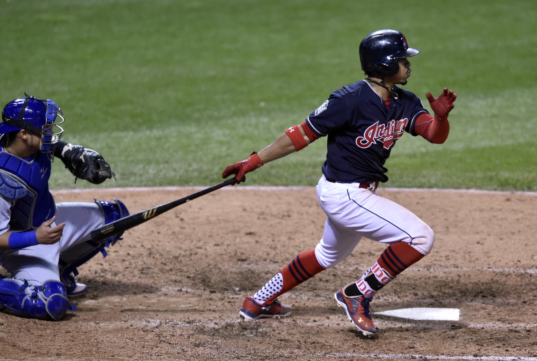 Oct 25, 2016; Cleveland, OH, USA; Cleveland Indians shortstop Francisco Lindor hits a double against the Chicago Cubs in the 7th inning in game one of the 2016 World Series at Progressive Field. Mandatory Credit: David Richard-USA TODAY Sports