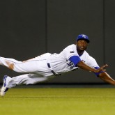 Apr 18, 2017; Kansas City, MO, USA; Kansas City Royals center fielder Lorenzo Cain (6) dives for a ball in the eleventh inning of the game against the San Francisco Giants at Kauffman Stadium. The Giants won 2-1. Mandatory Credit: Jay Biggerstaff-USA TODAY Sports