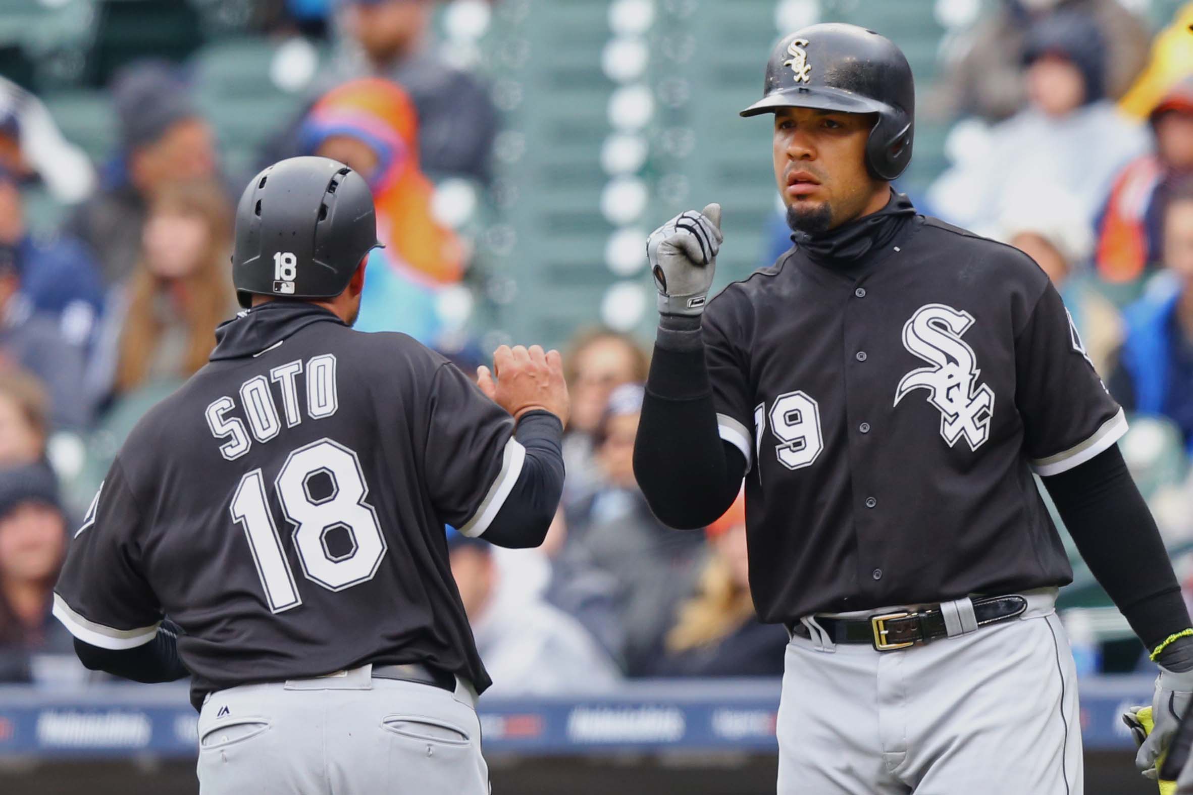 Apr 30, 2017; Detroit, MI, USA; Chicago White Sox catcher Geovany Soto (18) reacts to scoring a run with teammate first baseman Jose Abreu (79) in the fifth inning at Comerica Park. Mandatory Credit: Aaron Doster-USA TODAY Sports