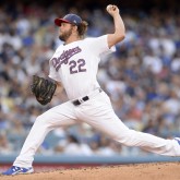 July 4, 2017; Los Angeles, CA, USA; Los Angeles Dodgers starting pitcher Clayton Kershaw (22) throws in the fourth inning against the Arizona Diamondbacks at Dodger Stadium. Mandatory Credit: Gary A. Vasquez-USA TODAY Sports