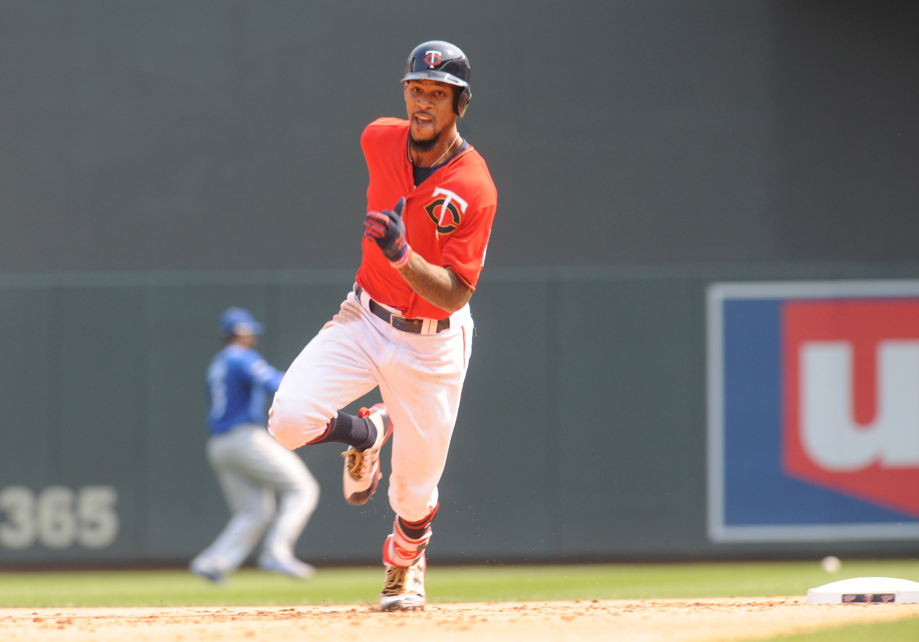 Sep 3, 2017; Minneapolis, MN, USA; Minnesota Twins center fielder Byron Buxton (25) rounds second base on his triple during the sixth inning against the Kansas City Royals at Target Field. Mandatory Credit: Marilyn Indahl-USA TODAY Sports