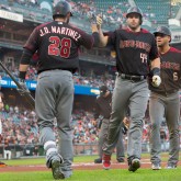 Sep 16, 2017; San Francisco, CA, USA; Arizona Diamondbacks first baseman Paul Goldschmidt (44) high fives right fielder J.D. Martinez (28) and left fielder David Peralta (6) after hitting a two run home run in the first inning against the San Francisco Giants at AT&T Park. Mandatory Credit: Andrew Villa-USA TODAY Sports