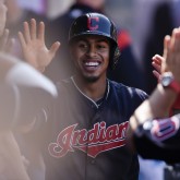 Apr 4, 2018; Anaheim, CA, USA; Cleveland Indians shortstop Francisco Lindor (12) celebrates with the dugout after scoring off an RBI single by second baseman Jason Kipnis (not pictured) during the fifth inning against the Los Angeles Angels at Angel Stadium of Anaheim. Mandatory Credit: Kelvin Kuo-USA TODAY Sports