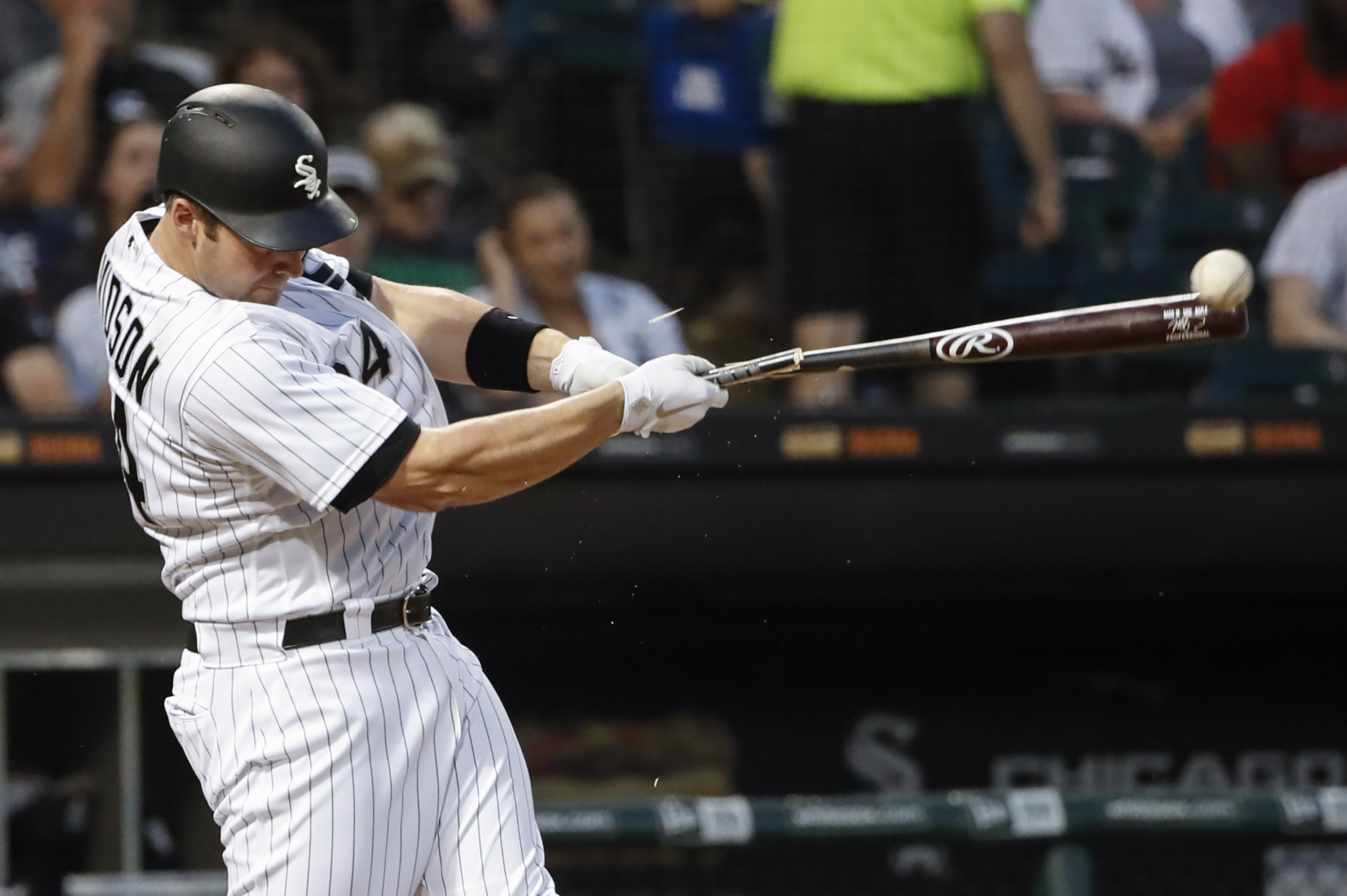 Jun 15, 2018; Chicago, IL, USA; Chicago White Sox designated hitter Matt Davidson (24) hits a single against the Detroit Tigers as he breaks hit bat during the fourth inning at Guaranteed Rate Field. Mandatory Credit: Kamil Krzaczynski-USA TODAY Sports