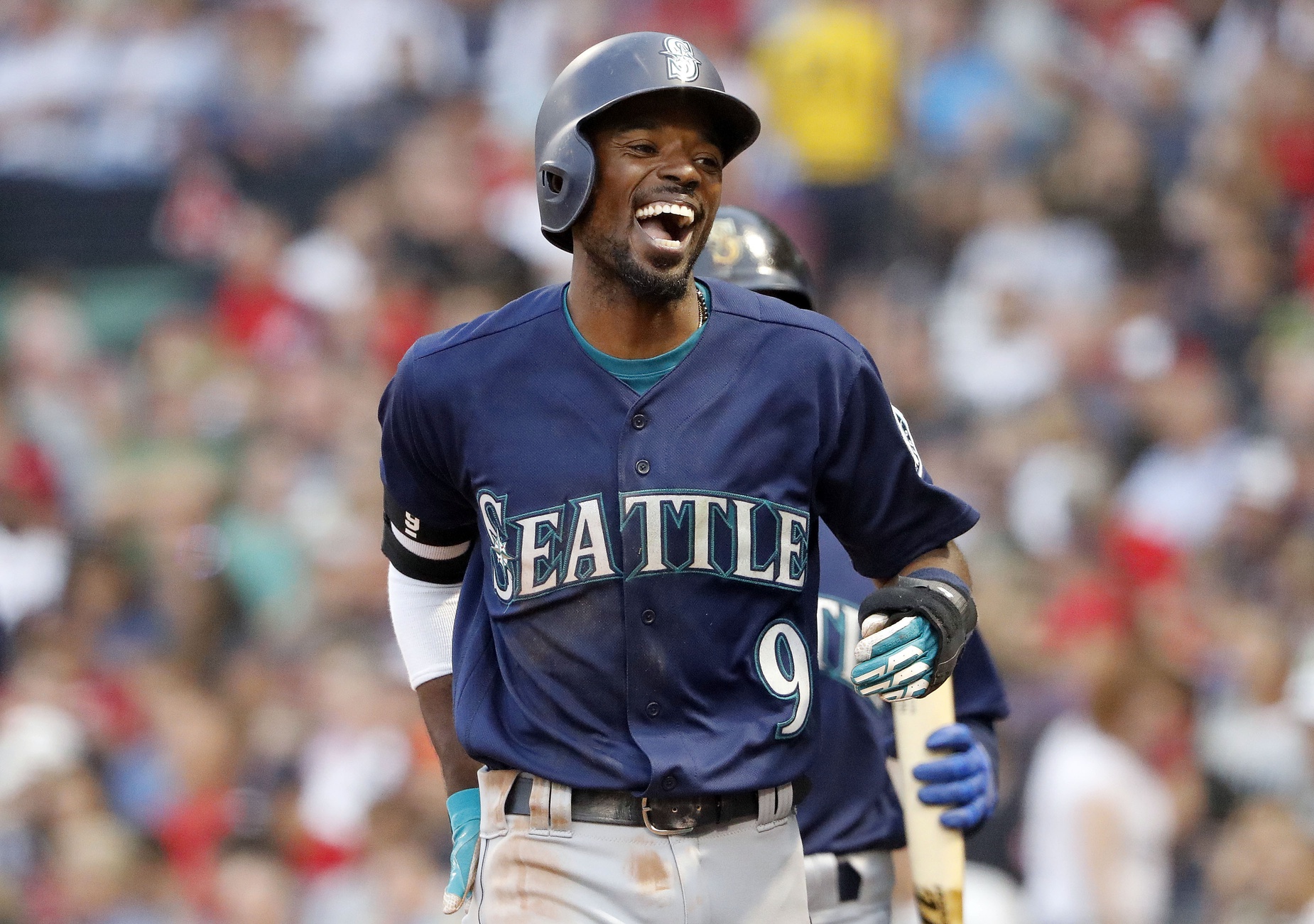 Jun 22, 2018; Boston, MA, USA; Seattle Mariners second baseman Dee Gordon (9) smiles after scoring a run against the Boston Red Sox during the second inning at Fenway Park. Mandatory Credit: Winslow Townson-USA TODAY Sports