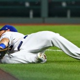 Aug 8, 2018; Kansas City, MO, USA; Kansas City Royals left fielder Alex Gordon (4) is unable to make the catch in the fifth inning against the Chicago Cubs at Kauffman Stadium. Mandatory Credit: Jay Biggerstaff-USA TODAY Sports