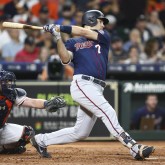 Sep 3, 2018; Houston, TX, USA; Minnesota Twins first baseman Joe Mauer (7) hits a single during the third inning against the Houston Astros at Minute Maid Park. Mandatory Credit: Troy Taormina-USA TODAY Sports